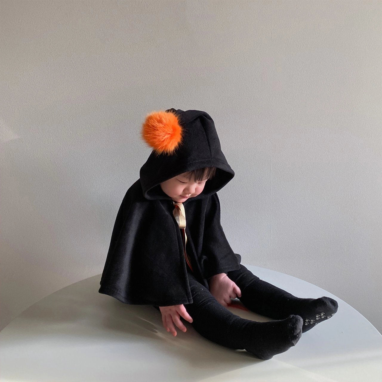 Orange Pompom Cone Cape